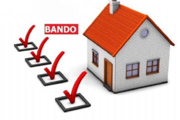 Immagine di una casa con la scritta BANDO